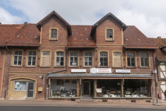 Antiques, former grocery store, business abandonment, brick building, Kleinalmerode, municipality,