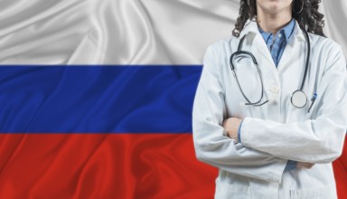 Medical professional on Russian flag. Healthcare and wellness in Russia, Concept