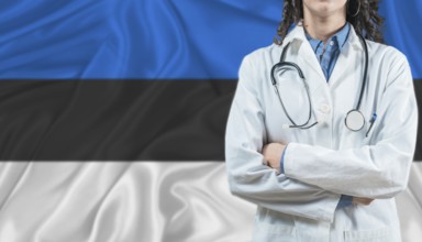Medical professional on Estonia flag. Healthcare and wellness in Estonia, Concept