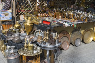 Stalls with antique metal souvenirs at traditional market, vernissage market, craft market,