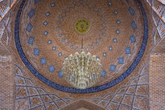 Magnificent dome with geometric patterns and central chandelier in a mosque, Blue Mosque, Shiite