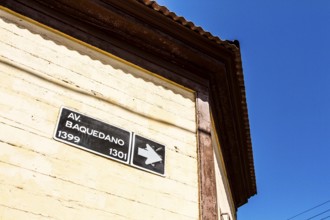Urban sign at Baquedano Street (Calle Baquedano). Iquique, Tarapaca Region, Chile