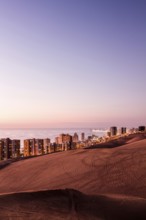 City of Iquique at dusk, viewed from Cerro Dragon. Iquique, Tarapaca Region, Chile. 15.11.15
