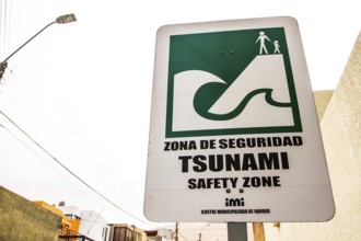Sign indicating safe zone in case of tsunami. Iquique, Tarapaca Region, Chile. 16.11.15