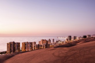 City of Iquique at dusk, viewed from Cerro Dragon. Iquique, Tarapaca Region, Chile. 15.11.15