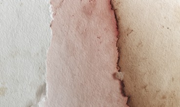 Watercolor texture with torn paper edges, featuring a gradient from pink to brown. AI generated