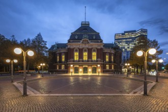 Laeiszhalle, formerly Musikhalle Hamburg, at Johannes Brahms Platz at Blue Hour with light clouds
