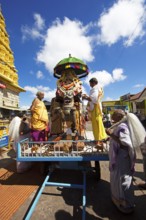 Puja at the Chamundeswar Hindu Temple on Chamundi Hill, Hindu monks prepare the chariot with the