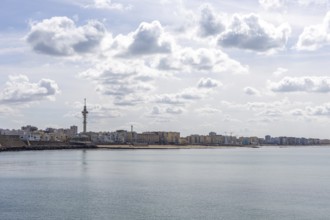 An old historic town. The skyline along the city beach and promenade shows its former glory. Cadiz