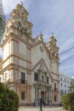 An old historic town. The Iglesia del Carmender church on the promenade shows its former glory of