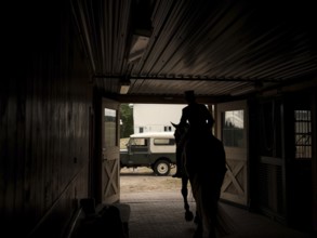 A rider from the Toronto North York Hunt Club, dressed in traditional hunting clothes, prior to a