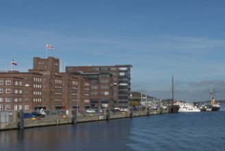 Former warehouse in the port of Kiel, apartments, services, red brick building, architecture,