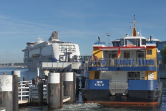 Fjord liner docks, ferry and cruise ship Color Magic of the Norwegian Color Line, Kiel port, car