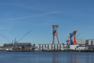 Shipyards with docks in Kiel port, equipped submarine under construction, armament, Thyssen Krupp