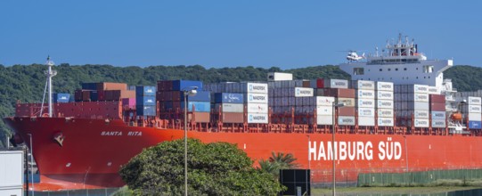 Container ship from the shipping company Hamburg Süd Santa Rita with container leaving Container