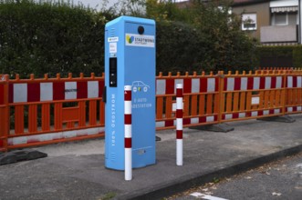 Parking lot with gas pump, EnBW charging station for electric cars, charging station, e-mobility,