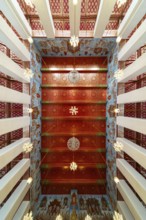 Photo from the frog persective:Ubosot (ordination hall) with columns (Sao) and richly decorated