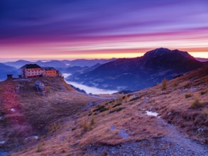 Watzmannhaus at dawn, fog in the valley, right Hoher Göll, Berchtesgaden National Park, Schönau am
