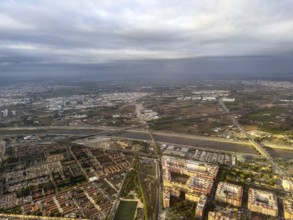 Residential areas, Turia flood canal and industrial areas, aerial view, Valencia, Spain
