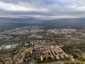 Fonteta district, Turia flood canal and road bridges behind, aerial view, Valencia, Spain