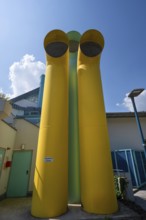 Colored vent pipes in front of Kurfürstenbad, outdoor pool, Amberg, Upper Palatinate, Bavaria,