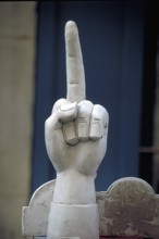 Sculpture of a hand with an extended index finger, France