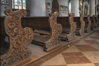 Artfully carved cheeks of church pews, St, Martin, Amberg Upper Palatinate, Bavaria, Germany