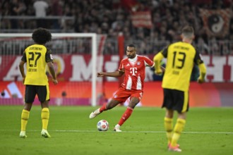 Jonathan Tah FC Bayern Munich FCB (04) Ball action Karim Adeyemi Borussia Dortmund BVB (27) Pascal