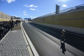 A young person is running on the blocked A100 during a demo on the 16th construction phase of the