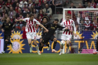 Dominique Heintz (1.FC Cologne, defense, #3), Chrislain Matsima (FC Augsburg, defense, #5),