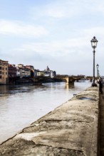 Arno River and Ponte Santa Trinita (Holy Trinity Bridge) in the background. Florence, Province of