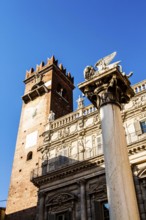 Column with the Lion of Saint Mark and Palazzo Maffei in the backgound at Piazza delle Erbe.