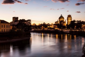 Adige River at evening and San Giorgio in Braida Church (Chiesa di San Giorgio in Braida) in the