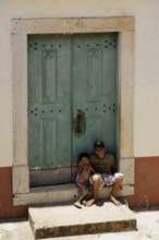 Seating boys in the Door, Alcântara, Maranhão, Brazil