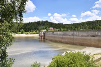 Dam at lake in the Black Forest in Forbach in Germany called Schwarzenbach Reservoir under a clear
