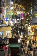 Busy shopping street in Essen, Kettwig Straße, pedestrian zone, pre-Christmas lighting Essen Light