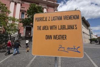 Sign on artificial rain system on Prešeren Square, Ljubljana, Slovenia