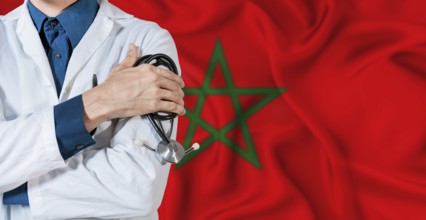 Morocco healthcare concept. Doctor with stethoscope on Morocco flag. Doctor holding stethoscope on