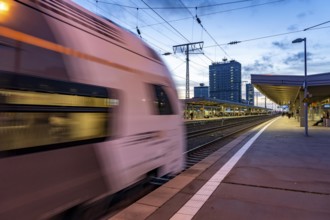 RRX, Rhein-Ruhr-Express, in Essen main station, passengers on the platform, North Rhine-Westphalia,