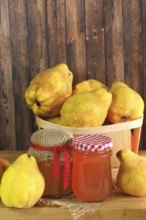 Picturesque still life with quince and quince jelly in a glass, autumn, Germany