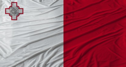 Maltese flag waving. Flag of Malta with cloth texture