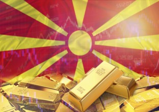 Gold bars on North Macedonia flag in background. Gold bars stacked on Macedonian flag. Concept of