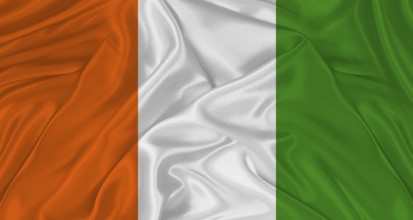Flag of Ivory Coast with cloth texture. Close up of Ivory Coast flag waving