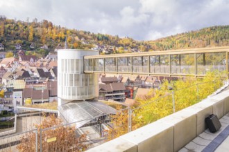 Bridge overlooking a town with autumn leaves and on a sunny day, ZOB Calw, Hermann Hessebahn, Calw,