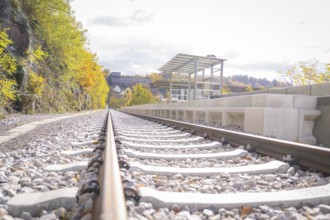 Railway system in autumn with a view of the platform and the surrounding area, ZOB Calw, Hermann