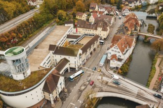 Urban crossroads in autumn, aerial view showing roads, bridges and river, ZOB Calw, Hermann