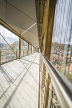 Modern glazed corridor with a view of a city, ZOB Calw, Hermann Hessebahn, Calw, Germany