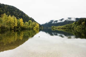 Picturesque mountain lake in autumn, Lac de Longemer, Xonrupt-Longemer, Vosges, Alsace-Lorraine,