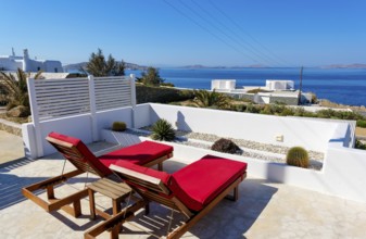 Mykonos, Cyclades, Greece - theme photo: vacation in Greece, sun loungers on the terrace of a