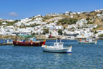 Mykonos, Cyclades, Greece - fishing boats are moored in the old port of Mykonos Town, Mykonos Chora